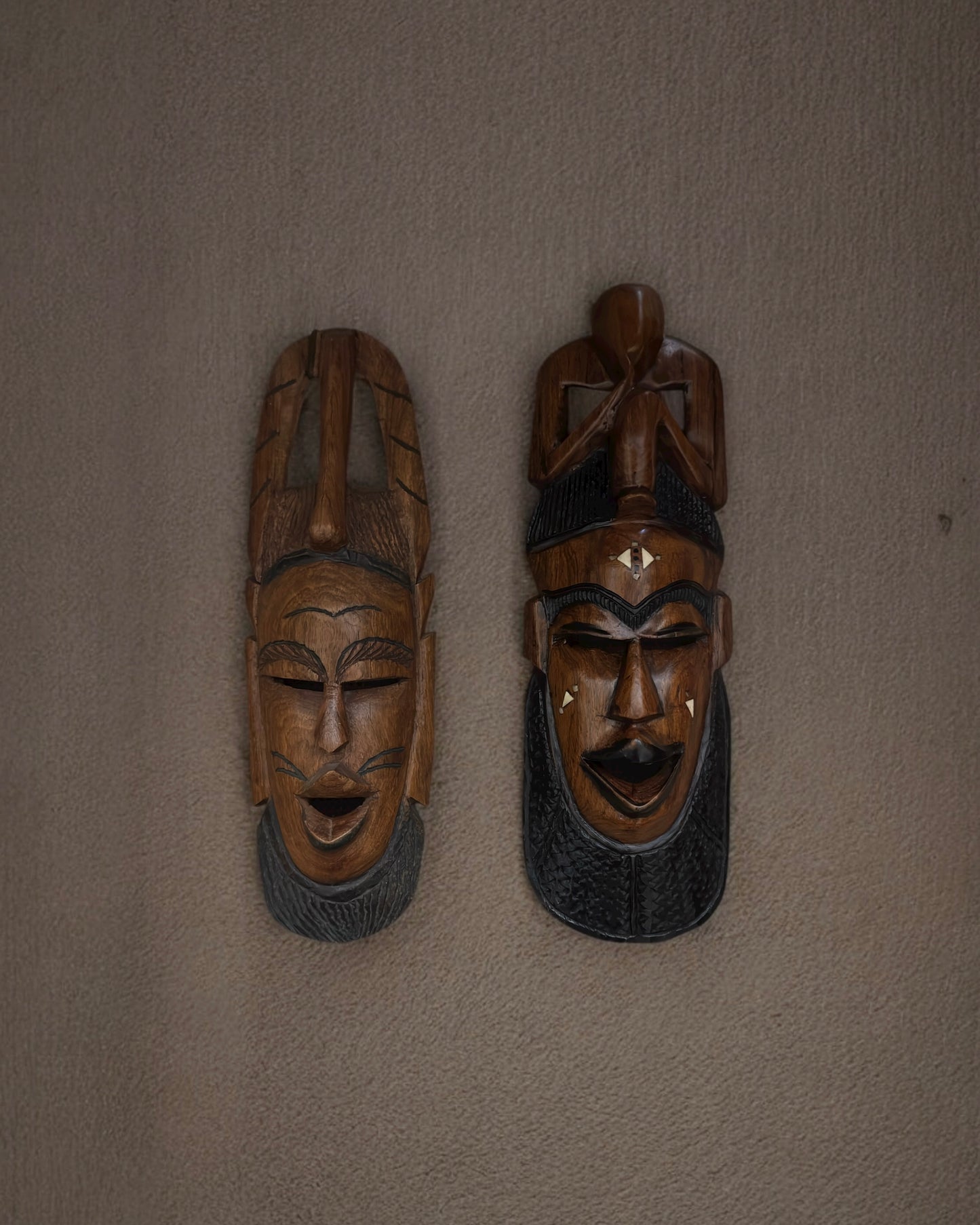 Hand-Carved African Hardwood Masks with Bone Inlay
