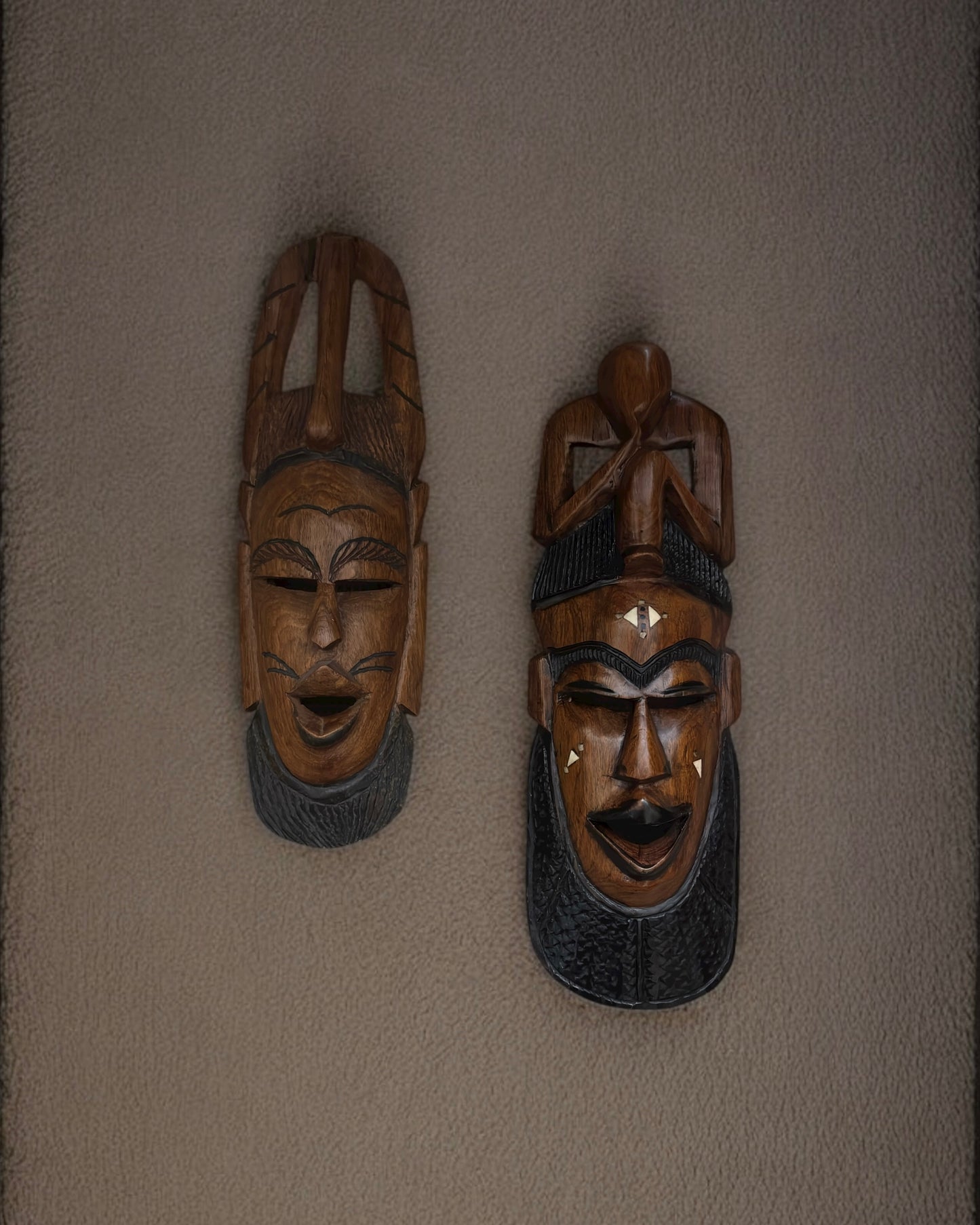 Hand-Carved African Hardwood Masks with Bone Inlay